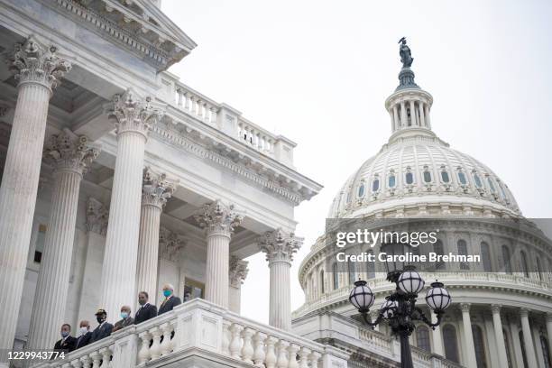 Rep. Emanuel Cleaver II, D-Mo., left, Rep. David Scott, D-Ga., left, incoming chairman of the House Agriculture Committee, Rep. Gregory Meeks,...