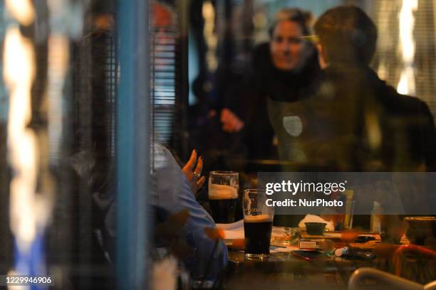 People enjoy dinning out in Dublin city center. Large parts of the hospitality sector across the country have reopened today following the easing of...