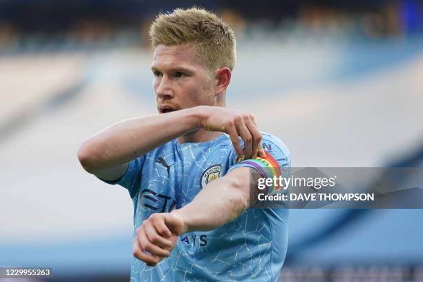 Manchester City's Belgian midfielder Kevin De Bruyne wears a rainbow coloured captain's armband during the English Premier League football match...