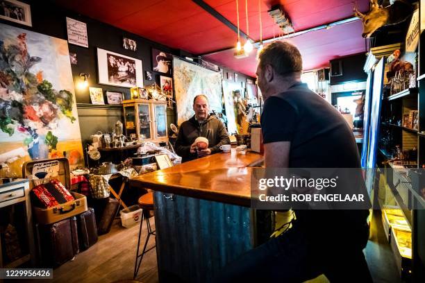 This picture shows the Cafe Prins Heerlijk temporarily converted into an antique shop in Bergen op Zoom, on December 5, 2020. - Due to the measures...