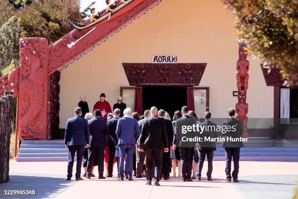 Prime Minister Jacinda Ardern and officials are welcomed onto Nga Hau E Wha National Marae on December 6, 2020 in Christchurch, New Zealand. The...