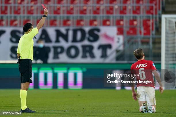 Fredrik Midtsjo of AZ Alkmaar receives a red card from referee Serdar Gozubuyuk during the Dutch Eredivisie match between AZ Alkmaar v FC Groningen...