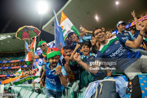 Indian fans celebrates their team's win during game two of the Twenty20 International series between Australia and India at Sydney Cricket Ground on...