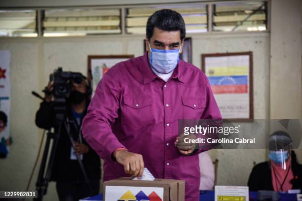 Nicolas Maduro enters to vote at Ecological School Simon Rodriguez on December 6, 2020 in Caracas, Venezuela. The ruling party of Nicolás Maduro...