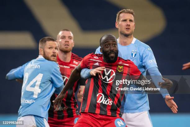 Ronald Mukiibi of Ostersunds FK and Ola Toivonen of Malmo FF during the Allsvenskan match between Malmo FF and Ostersunds FK at Eleda Stadion on...