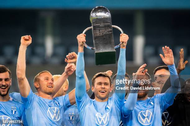 Players of Malmo FF celebrates the first place in Allsvenskan match between Malmo FF and Ostersunds FK at Eleda Stadion on December 6, 2020 in Malmo,...