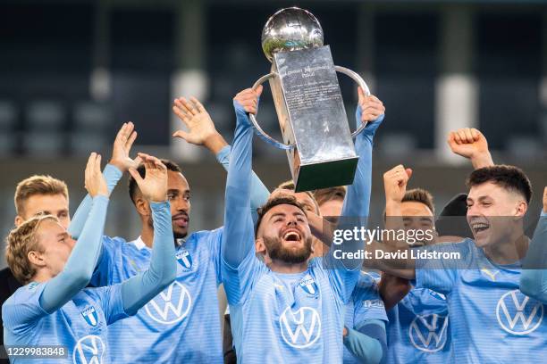 Isaac Kiese Thelin of Malmo FF, Erdal Rakip of Malmo FF, Anel Ahmedhodzic of Malmo FF and players of Malmo FF celebrates the first place in...