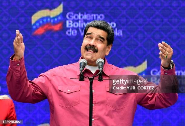 Venezuelan President Nicolas Maduro gestures while delivering a press conference at a polling station in the Simon Rodriguez school in Fuerte Tiuna,...