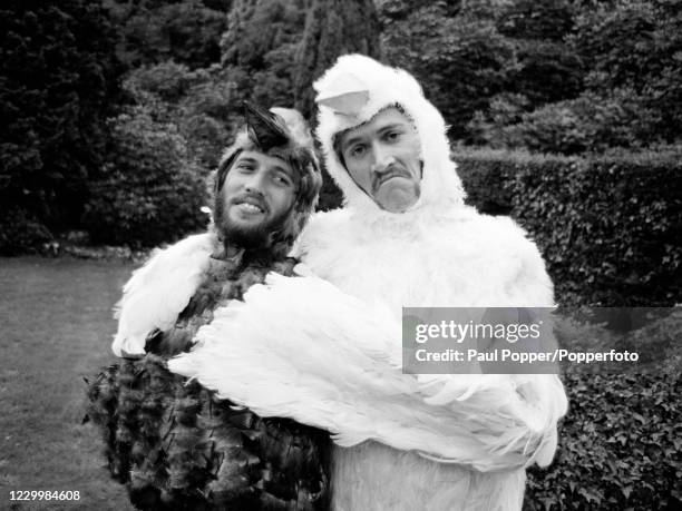 The Bee Gees' Barry Gibb and Maurice Gibb dressed as birds during the filming of "Cucumber Castle", a comedy film written and produced by The Bee...