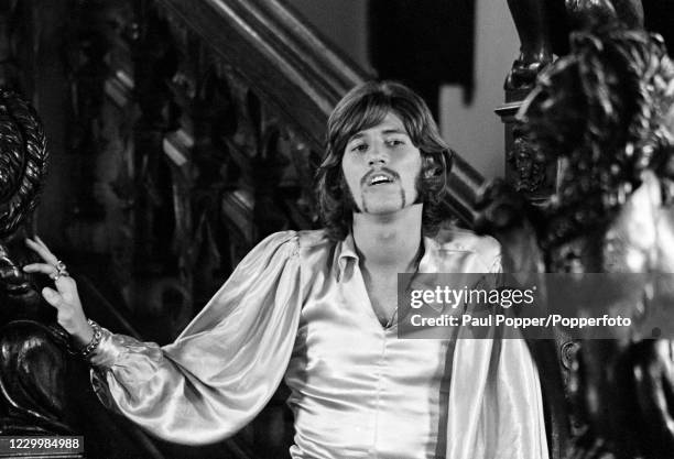 Barry Gibb of The Bee Gees playing Prince Frederick during the filming of "Cucumber Castle", a comedy film written and produced by The Bee Gees to...