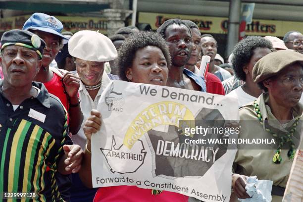 Supporters march in Johannesburg supporting De Klerk's victory on "Yes" referendum on March 18, 1992. - A referendum on ending apartheid was held in...