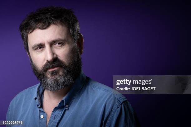 French film director Quentin Dupieux poses during a photo session in Paris on December 7, 2020.