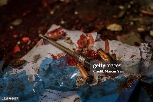 Bloody remains of items could be seen in the classroom floor from the dead attack Kabul University, AfghanistanÕs largest university, where three...