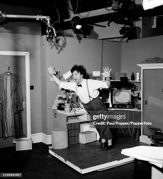 British comedian and entertainer Ken Dodd during a sketch being rehearsed at a TV studio in Manchester, circa 1967.