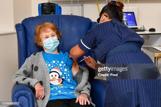 Margaret Keenan is the first patient in the United Kingdom to receive the Pfizer/BioNtech covid-19 vaccine at University Hospital, Coventry,...