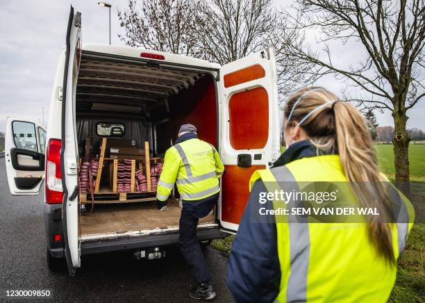 Employees of the Human Environment and Transport Inspectorate conduct a road check along the A12 near Babberich in the municipality of Zevenaar, on...