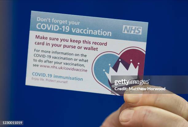 Close-up of a COVID-19 vaccination card at Cardiff and Vale Therapy Centre on December 8, 2020 in Cardiff, Wales. More than 50 hospitals across...