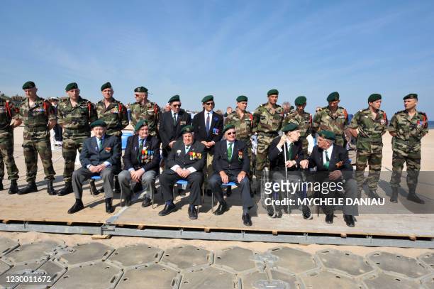 Members of the Kieffer commando, Hubert Faure, Yves Meudal, Rene Rossey, Jean Morel, and Leon Gautier attend a ceremony commemorating the armistice...