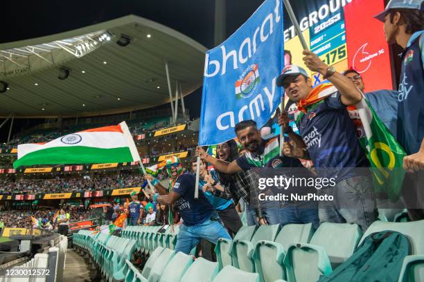 Indian fans show their support during game three of the Twenty20 International series between Australia and India at Sydney Cricket Ground on...