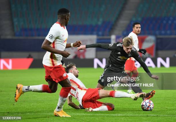 Leipzig's Slovenian midfielder Kevin Kampl and Manchester United's English defender Brandon Williams vie for the ball during the UEFA Champions...