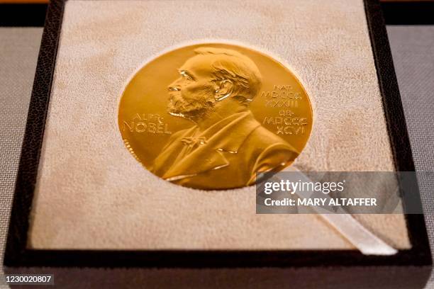 The Nobel prize medal, presented to Charles M. Rice in Physiology or Medicine, is seen after Swedish Consul General Annika Rembe presented it to him...