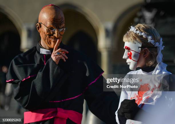 Activists dressed as clergymen and kids, their victims, during a protest against the institutional protection of sex offenders, organized today in...