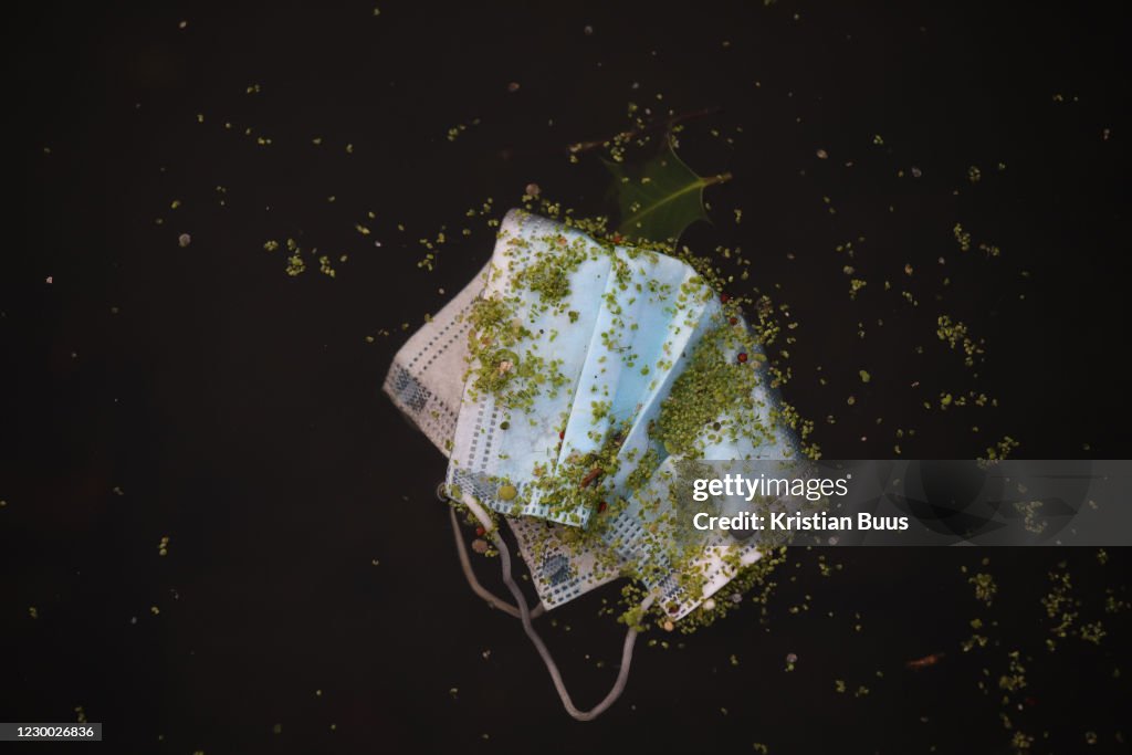 A Surgical Mask Lies In Regents Canal