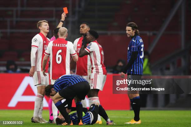 Ryan Gravenberch of Ajax receives red card, Perr Schuurs of Ajax, Davy Klaassen of Ajax, Marten de Roon of Atalanta Bergamo, Alejandro Gomez of...