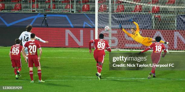 Caoimhin Kelleher of Liverpool can't stop the penalty kick of Alexander Scholz of Midtjylland during the UEFA Champions League Group D stage match...