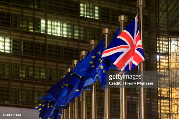 The European Union Flag and the Union Jack are seen in front of the Berlaymont, the EU Commission headquarter on December 09, 2020 in Brussels,...
