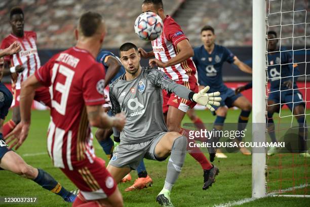 Porto's Portuguese goalkeeper Diogo Costa watches the ball during the UEFA Champions League Group C football match between Olympiakos and FC Porto on...