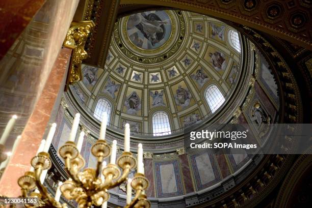 An interior view of the dome inside St Stephen's Basilica, in Budapest. It is one of the largest churches in the country and is dedicated to the...