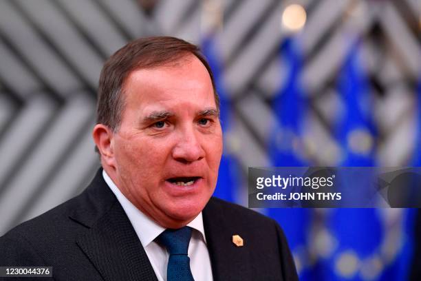 Sweden's Prime Minister Stefan Lofven talks to the press as he arrives at the EU headquarters' Europa building in Brussels on December 10 prior to a...