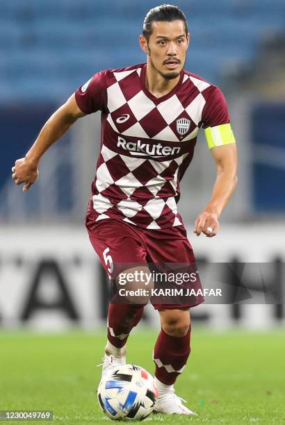 Kobe's midfielder Hotaru Yamaguchi runs with the ball during the AFC Champions League quarter finals football match between Japan's Vissel Kobe and...