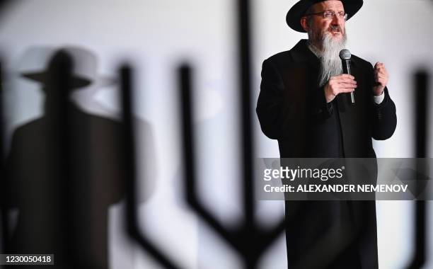 Chief Rabbi of Russia Berel Lazar delivers a speech at the ceremony of lighting the Hanukkah menorah on December 10, 2020 in Moscow, to usher in the...