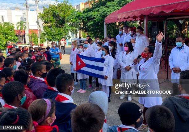 High-school students and medical doctors take part in the celebration of the Human Rights Day in Havana, on December 10, 2020.