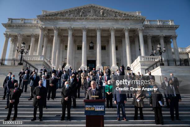 House Minority Leader Kevin McCarthy , surrounded fellow House Republicans, speaks during a news conference outside the U.S. Capitol December 10,...
