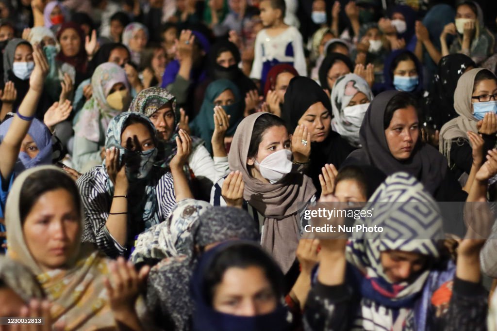 Women Refugees Pray On The Roads Of Lesbos Island