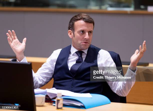 French President Emmanuel Macron waits for the start of the second day of an EU Summit in the Europa, the European Union Council headquarter on...