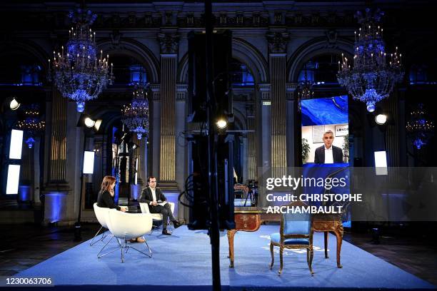 London mayor Sadiq Khan appears on a screen as she speaks during an event held by videoconference to mark the 5th anniversary of the Paris agreements...