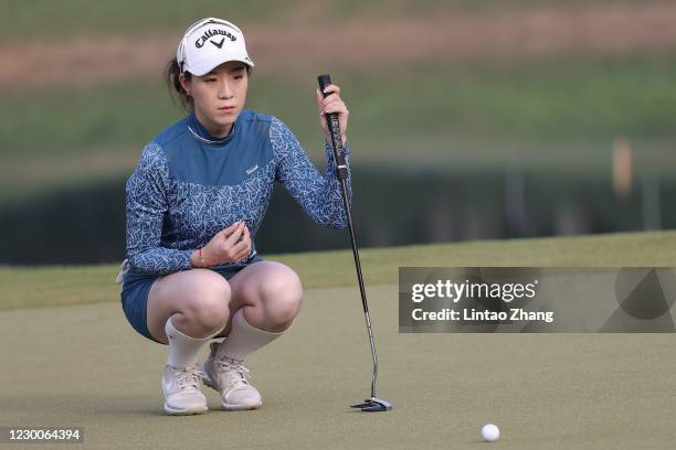 Volvo China Open's first female player Zhang Jienalin of China lines up a putt on the 13th hole during the second round of Volvo China Open 2020 at...