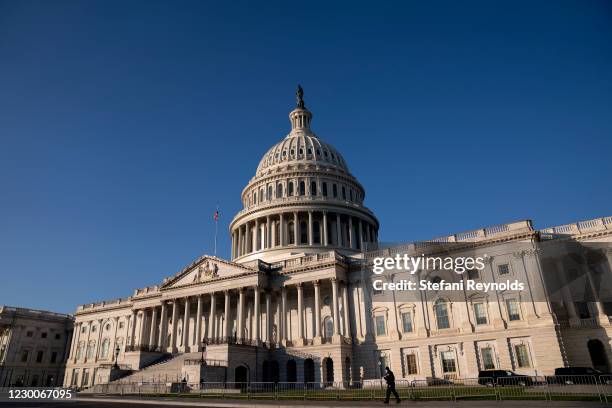 The U.S. Capitol stands on December 11, 2020 in Washington, DC. Lawmakers are facing a midnight deadline to pass a continuing resolution to avert a...