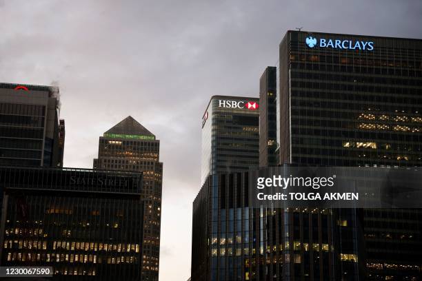 The offices of banking giants HSBC and Barclays are pictured at the the secondary central business district of Canary Wharf on the Isle of Dogs, east...