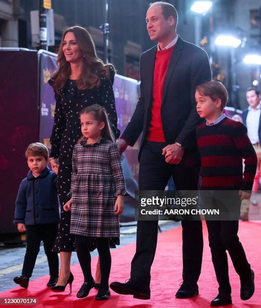 Britain's Prince William, Duke of Cambridge, his wife Britain's Catherine, Duchess of Cambridge, and their children Britain's Prince George of...