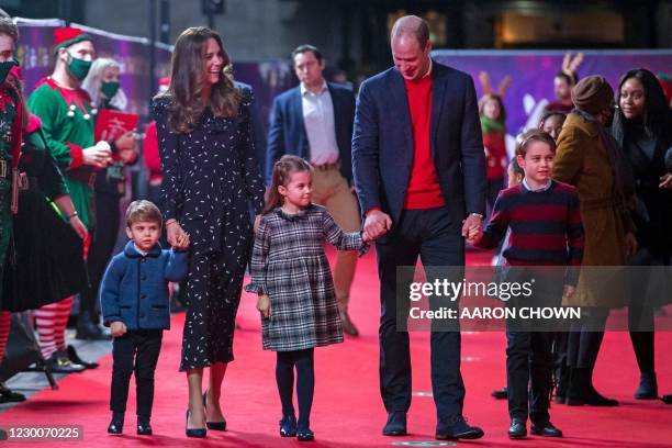 Britain's Prince William, Duke of Cambridge, his wife Britain's Catherine, Duchess of Cambridge, and their children Britain's Prince George of...