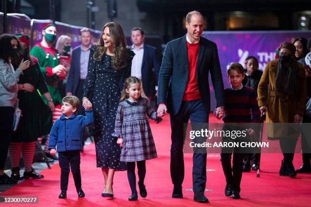 Britain's Prince William, Duke of Cambridge, his wife Britain's Catherine, Duchess of Cambridge, and their children Britain's Prince George of...