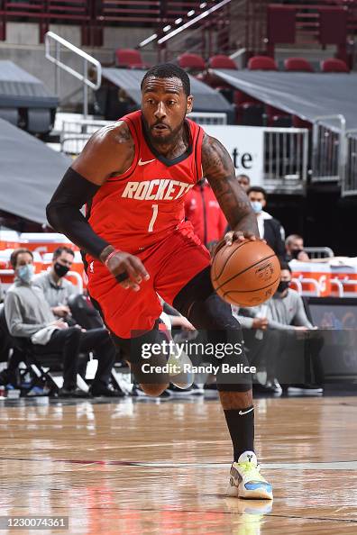John Wal Rockets John Wall of the Houston Rockets drives to the basket against the ...