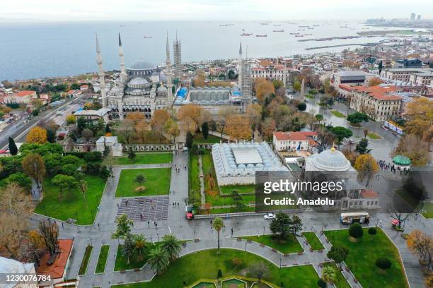Drone photo shows an aerial view of empty surroundings of Sultanahmet Mosque after a general curfew imposed weekend-long from Friday 9 p.m. To Monday...