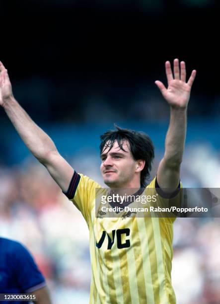 Charlie Nicholas of Arsenal celebrates after scoring during the Canon League Division One match between Chelsea and Arsenal at Stamford Bridge on...
