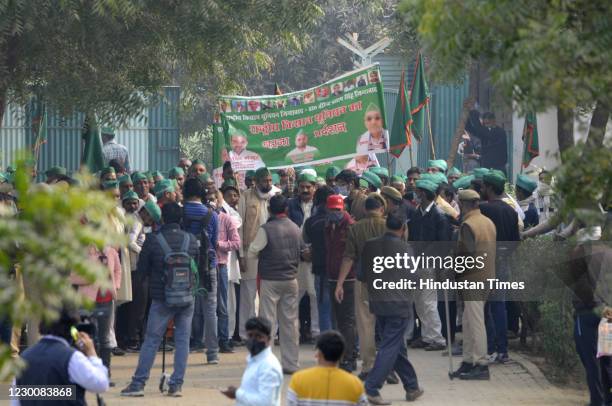 Farmers gathered near Yamuna expressway's Jewar Toll plaza, on December 12, 2020 in Greater Noida, India. The increase in security arrangement comes...